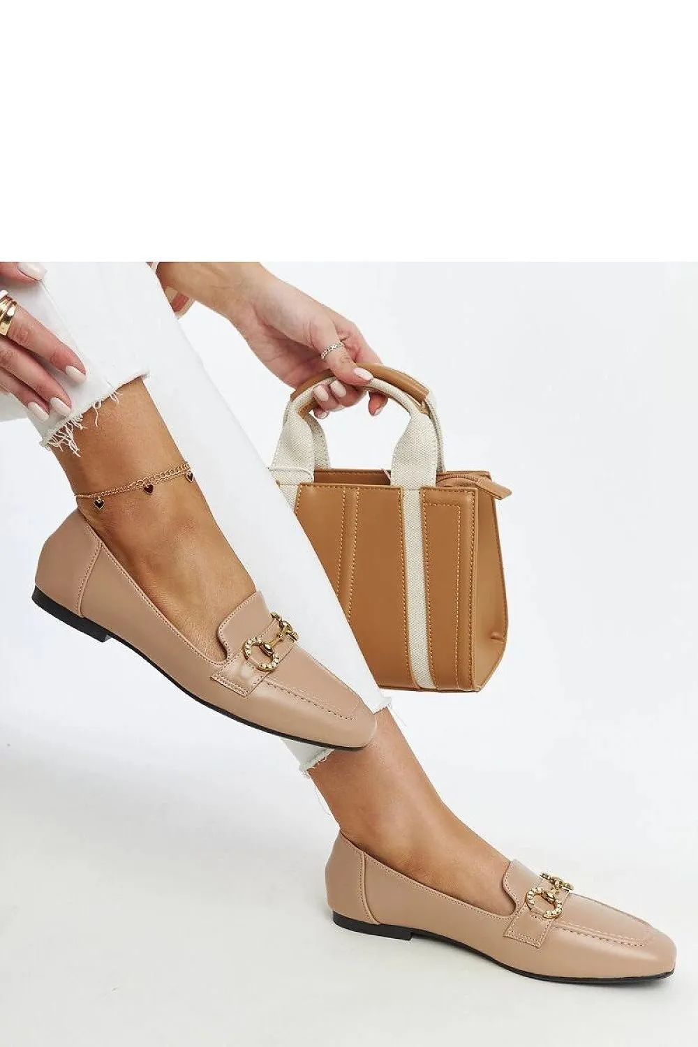 Mocassin adorned with rhinestones