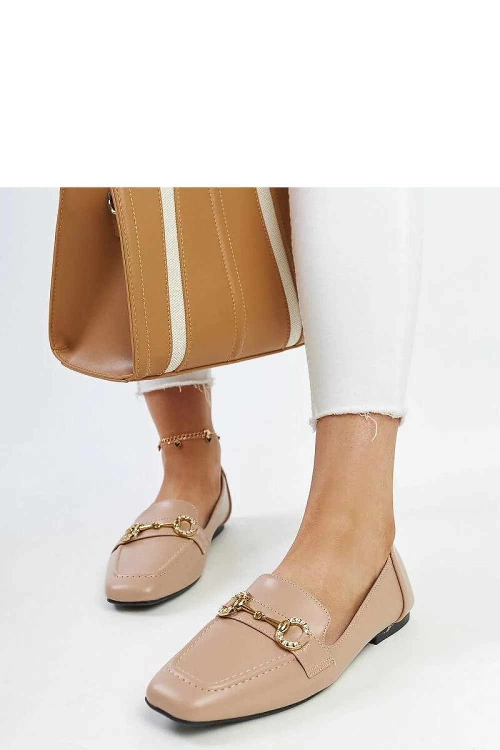Mocassin adorned with rhinestones
